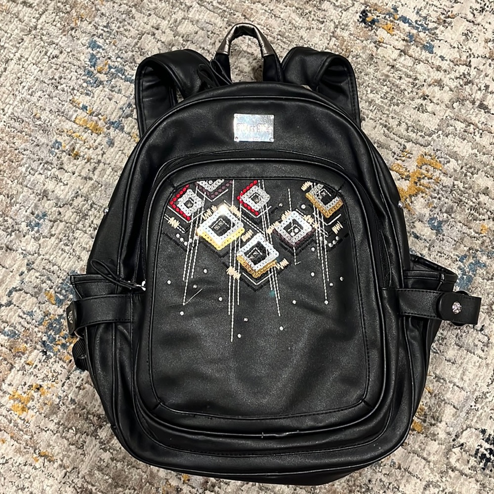 Miss Me black backpack.